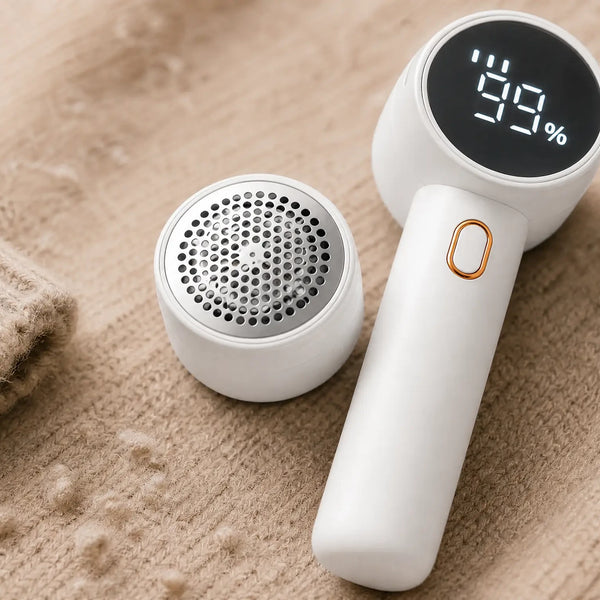 The shaver resting on a beige knit sleeve with visible pills